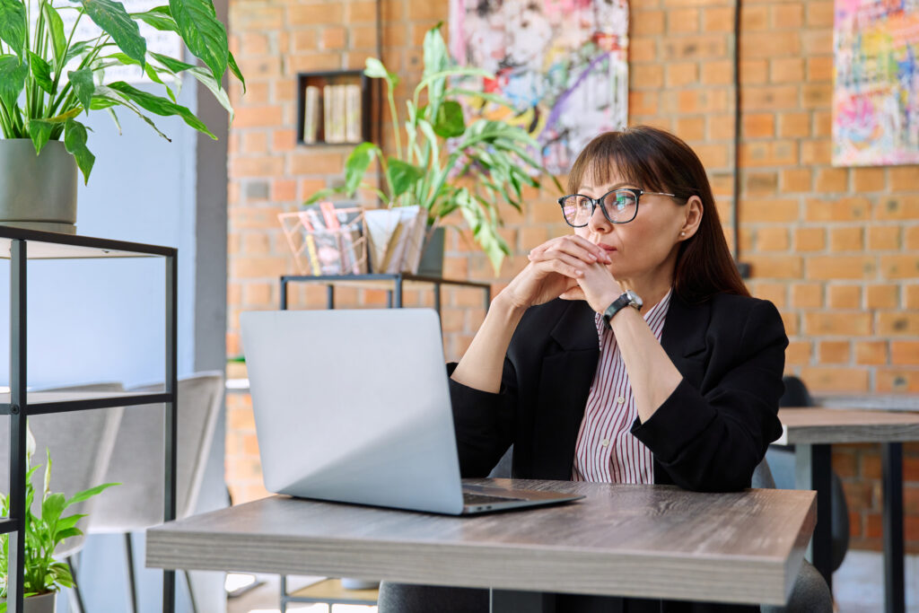 Business owner reviewing Windows 10 computer after end of support deadline